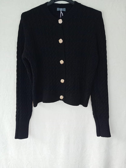 Strickjacke- Strickmuster- Schwarz